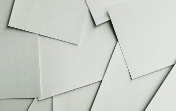 Wallpaper Scattered Sheets of White Paper