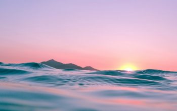 Wallpaper Calm Body of Water During Golden Hour