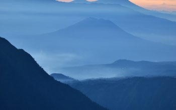 Wallpaper High Angle Photography of Lighted City Near Mountain