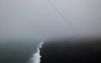 Wallpaper Aerial View Photography of Body of Water Surrounded by Fogs