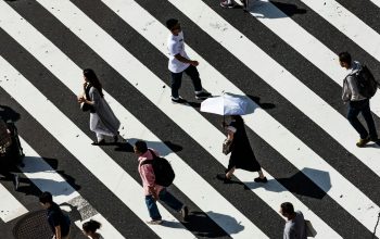 Wallpaper People Walking on Pedestrian Lane