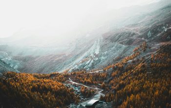 Wallpaper Aerial Photography of Brown Trees and Mountains Under White Clouds