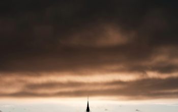 Wallpaper Silhouette of Tower Under Gray Clouds