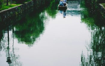 Wallpaper Person Riding Canoe