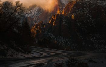 Wallpaper Roadway Through Rocky Mountains