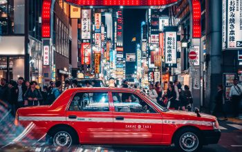 Wallpaper Red Car on City