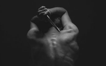 Wallpaper Man Holding Gray Dagger