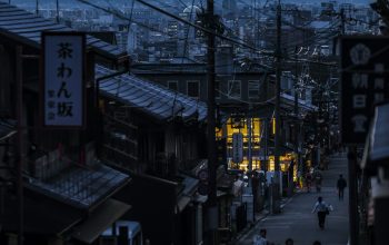 Wallpaper Aerial View Photography of People Walking Between Houses