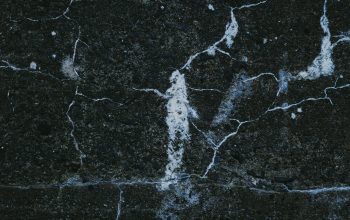 Wallpaper A Close Up of a Black Marble Surface