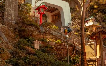 Wallpaper Two People Ascending Pagoda Stairs