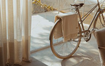 Wallpaper White Bike Near Glass Wall