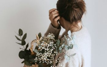 Wallpaper Woman Carrying White Flower Plant