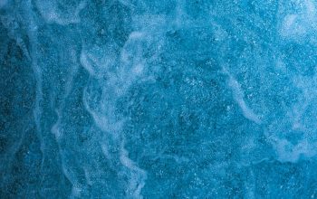 Wallpaper A Close Up of a Blue Water Surface