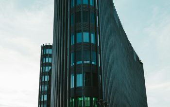 Wallpaper Grey and Teal High-Rise Building