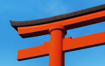 Wallpaper Orange and Black Cross Under Blue Sky