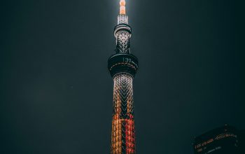 Wallpaper Red and White Tower at Night