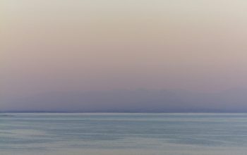 Wallpaper Calm Sea Under Blue Sky During Daytime