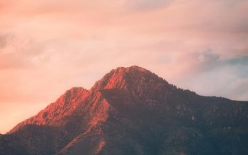Wallpaper Brown Rocky Mountain Under Cloudy Sky During Daytime