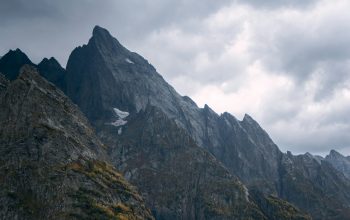 Wallpaper Gray Rocky Mountain Under White Cloudy Sky During Daytime