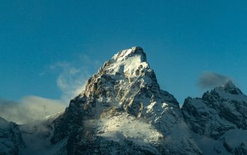 Wallpaper Snow-Covered Mountain Under Blue Sky
