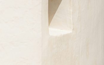 Wallpaper White Concrete Wall with Hole