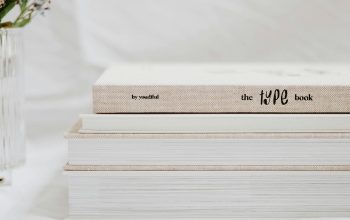 Wallpaper White and Brown Book on White Textile