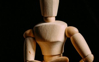 Wallpaper Brown Wooden Human Figure on Black Textile