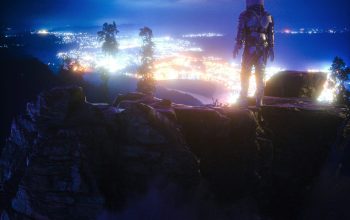 Wallpaper Man Standing on Rock Formation at Night
