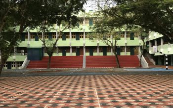 Wallpaper A Large Building with a Red and White Checkered Floor
