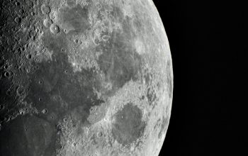 Wallpaper A Close Up of the Moon with a Black Background
