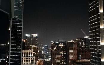 Wallpaper A View of a City at Night from a High Rise