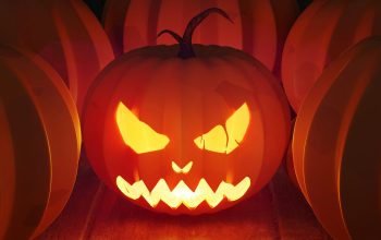 Wallpaper A Carved Pumpkin with a Face