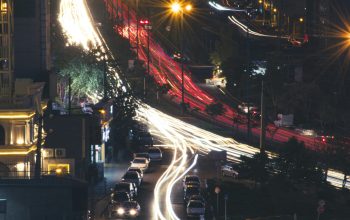 Wallpaper A Busy Street at Night