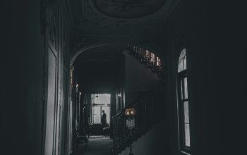 Wallpaper A Dark Hallway with a Staircase