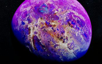 Wallpaper A Purple and Blue Object Floating in Air