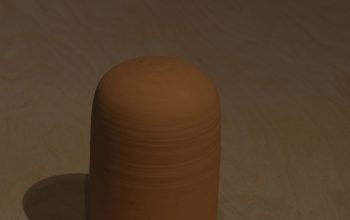 Wallpaper A Brown Vase on a Wooden Table
