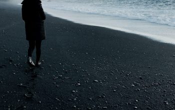 Wallpaper Person Walking Near Body of Water
