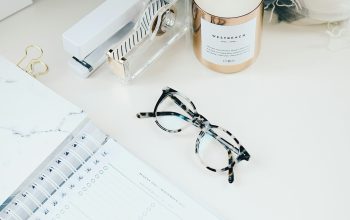 Wallpaper Black Framed Eyeglasses Beside Spiral Notebook