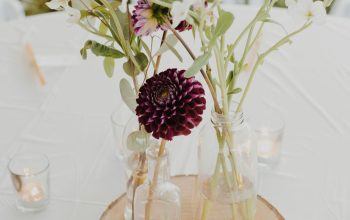 Wallpaper White Flower Arrangement on Glass Bottle