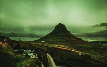 Wallpaper Waterfalls Near Mountain Under Green Sky