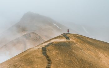 Wallpaper Man on Top Brown Hill