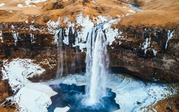 Wallpaper Aerial Photography of Waterfalls Near Mountains at Daytime