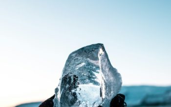 Wallpaper Person Holding a Block of Ice