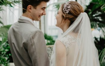 Wallpaper Bride and Groom Surrounded by Plants