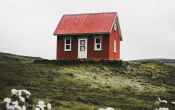 Wallpaper Red and White House Surrounded by Green Grass Field