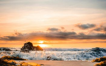 Wallpaper Ocean Smashed to Sand During Golden Hour