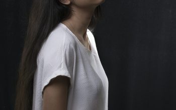 Wallpaper Woman in White Shirt Sitting on Chair
