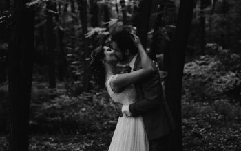 Wallpaper Grayscale Couple Kissing Under Forest Trees