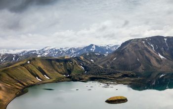 Wallpaper White Clouds Over Body of Water and Green Mountains