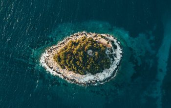 Wallpaper Aerial Photography of Island Surrounded by Sea